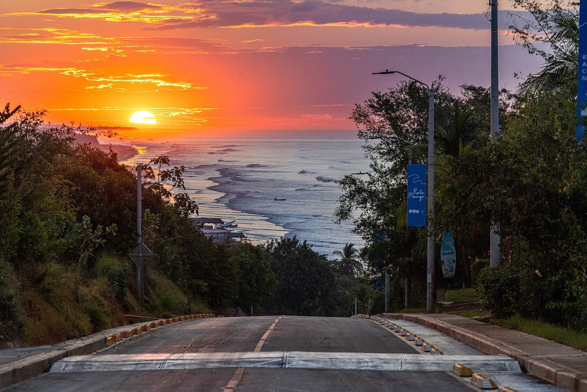 A road running down to the Pacific at sunset, Surf City II, El Salvador